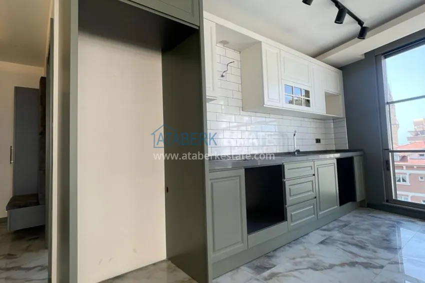 Приобрести Квартиры от собственника с дизайнерской чистовой отделкой в новостройке - центр Алании, район пляжа Клеопатра 10 