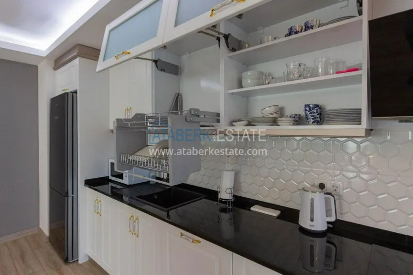 Приобрести Дуплекс 3+1 меблированный с видом на море и горы в новом комплексе, район Махмутлар – Алания 12 