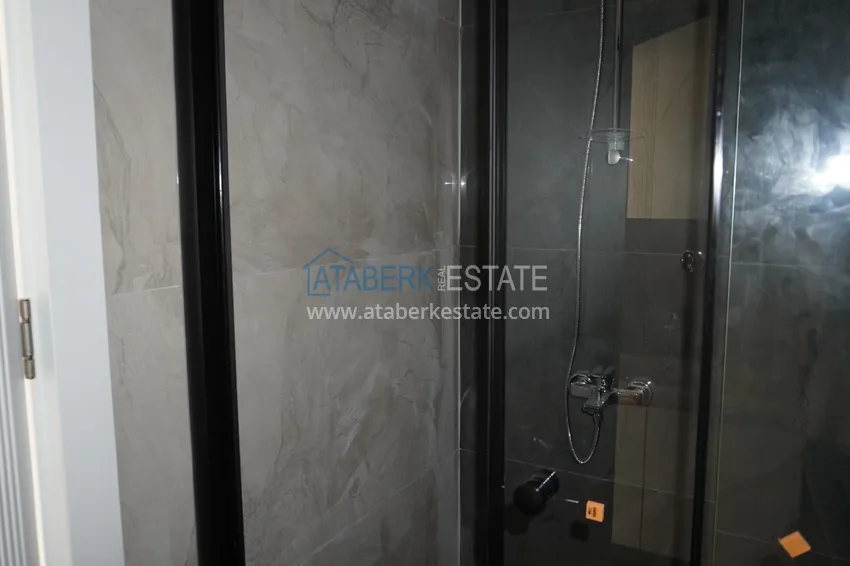 Приобрести Квартира 1+1 с чистовой отделкой в современном городском доме в самом центре Алании 10 