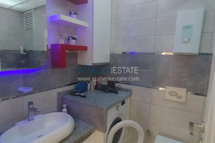 Приобрести Квартира 2+1 меблированная в комфортабельном комплексе всего в 200 метрах от моря, район Махмутлар – Алания 11 