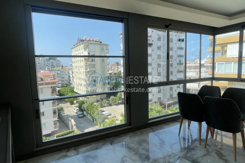 Приобрести Квартиры от собственника с дизайнерской чистовой отделкой в новостройке - центр Алании, район пляжа Клеопатра 12 