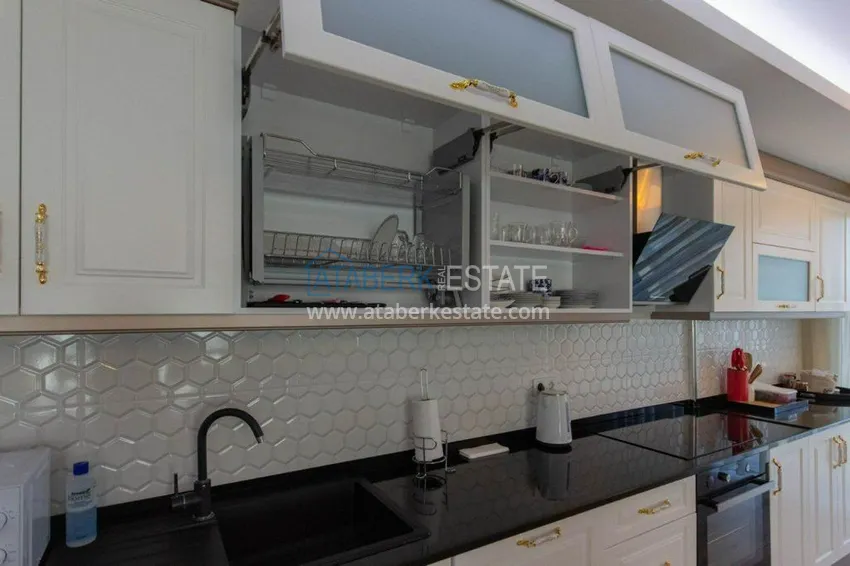 Приобрести Дуплекс 3+1 меблированный с видом на море и горы в новом комплексе, район Махмутлар – Алания 13 