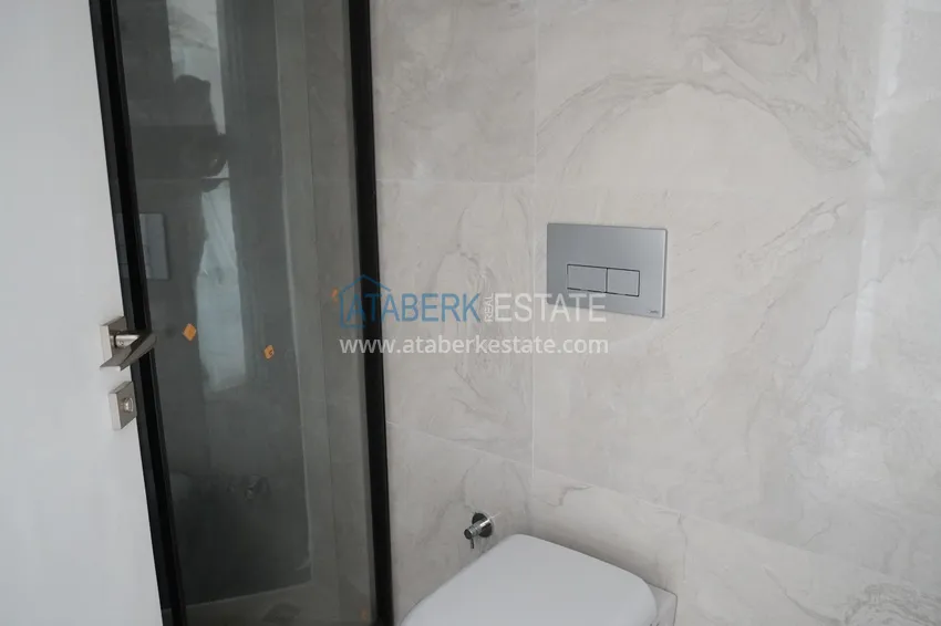 Приобрести Квартира 1+1 с чистовой отделкой в современном городском доме в самом центре Алании 11 