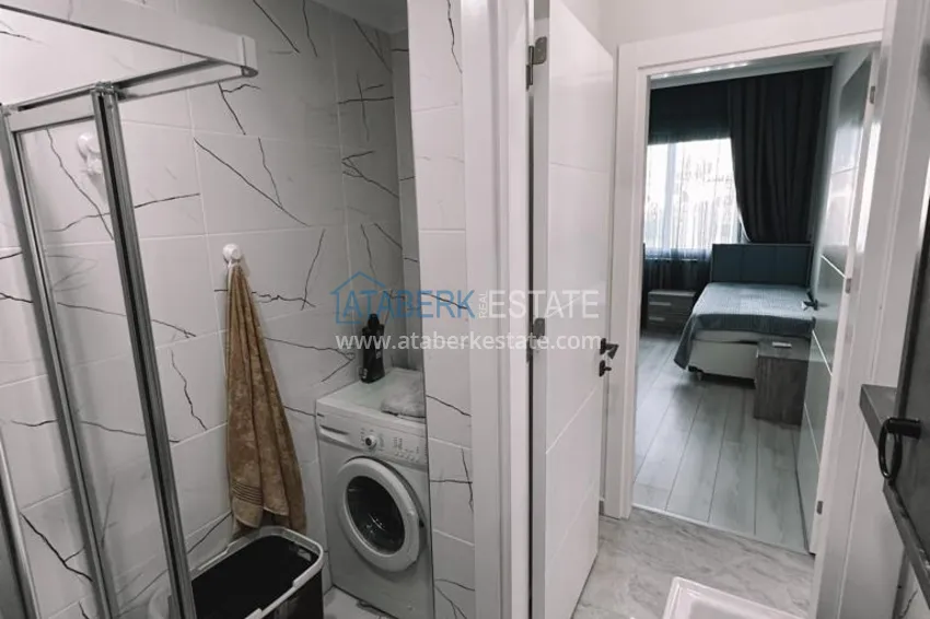 Приобрести Меблированная квартира в центре Алании, трехкомнатная с застекленным балконом 12