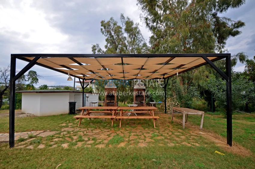 Квартира 2+1 с видом на горы и крепость в комплексе комфорт-класса с собственным пляжем, район Демирташ – Алания 19 