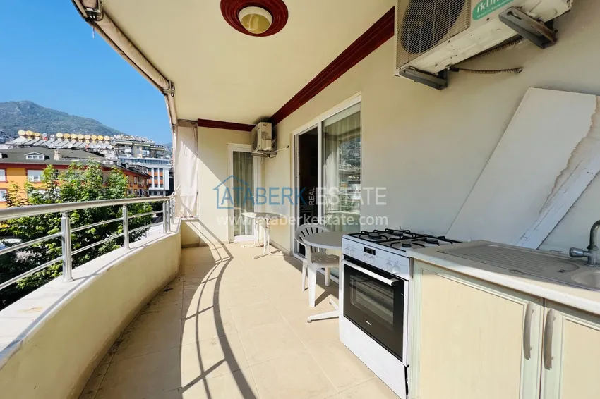 Приобрести Квартира 2+1 с мебелью и застеклённым балконом в комплексе с инфраструктурой - центр Алании 13 