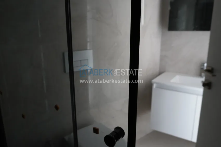 Приобрести Квартира 1+1 с чистовой отделкой в современном городском доме в самом центре Алании 13 