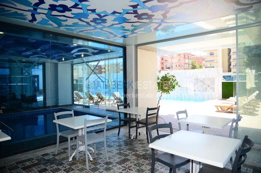 Квартира 2+1 меблированная в комфортабельном комплексе всего в 200 метрах от моря, район Махмутлар – Алания 13 