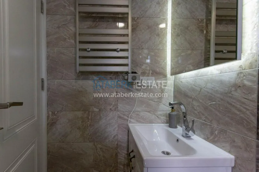 Приобрести Дуплекс 3+1 меблированный с видом на море и горы в новом комплексе, район Махмутлар – Алания 16 