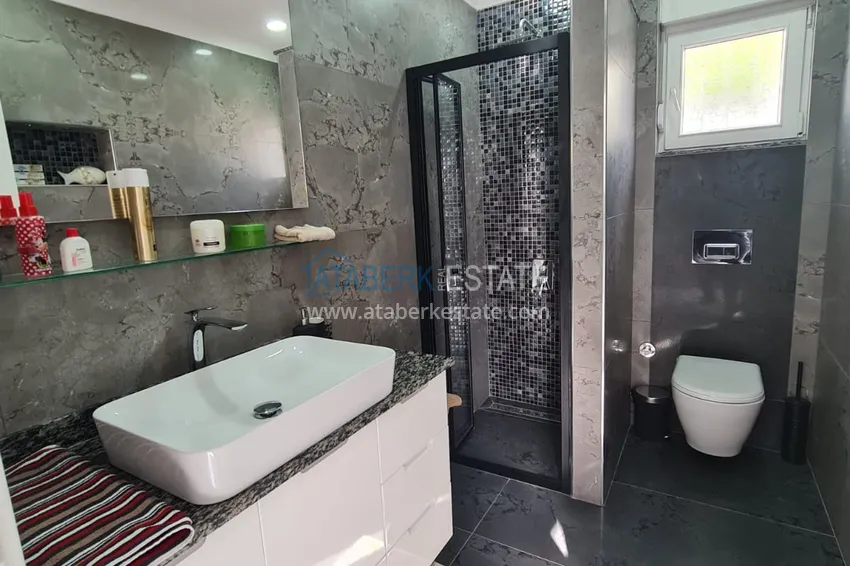 Приобрести Двухэтажная вилла с потрясающим видом на море в районе Каргыджак, Алания. Подходит для гражданства 16 