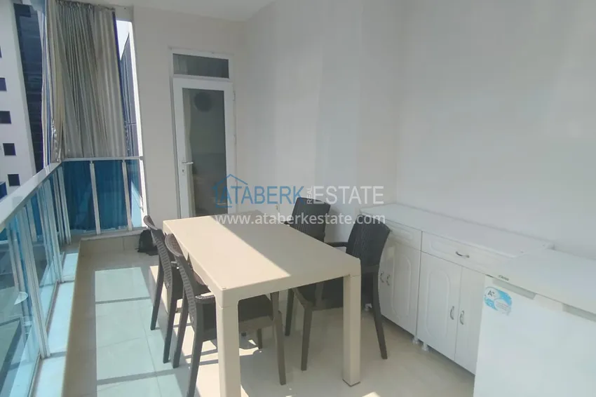 Приобрести Квартира 2+1 меблированная в комфортабельном комплексе всего в 200 метрах от моря, район Махмутлар – Алания 15 