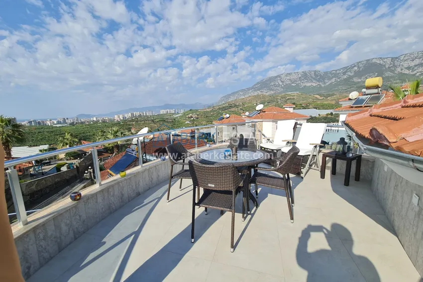 Приобрести Двухэтажная вилла с потрясающим видом на море в районе Каргыджак, Алания. Подходит для гражданства 17 