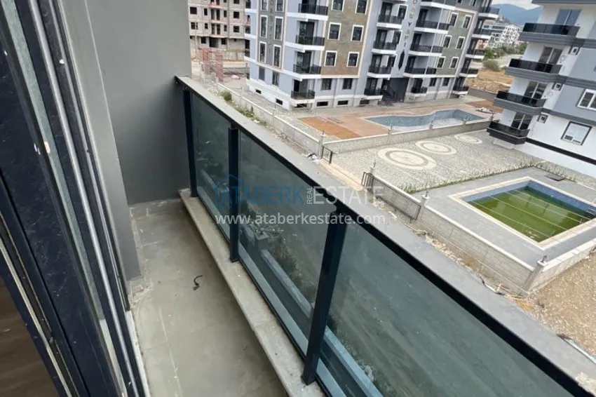 Приобрести Линейная квартира 3+1 с чистовой отделкой и видом на море в Газипаше, район Пазарджи  12 