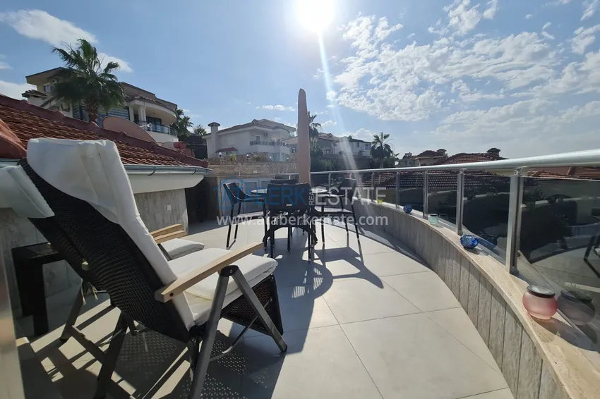 Приобрести Двухэтажная вилла с потрясающим видом на море в районе Каргыджак, Алания. Подходит для гражданства 19 