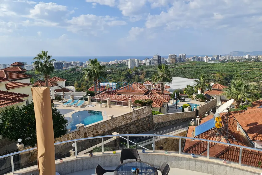 Приобрести Двухэтажная вилла с потрясающим видом на море в районе Каргыджак, Алания. Подходит для гражданства 20 