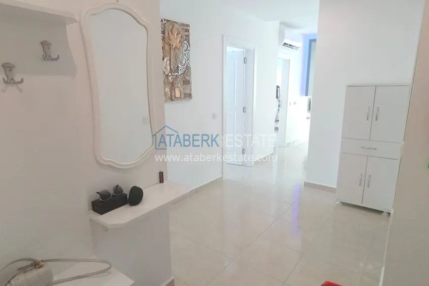 Приобрести Квартира 2+1 меблированная в комфортабельном комплексе всего в 200 метрах от моря, район Махмутлар – Алания 1 