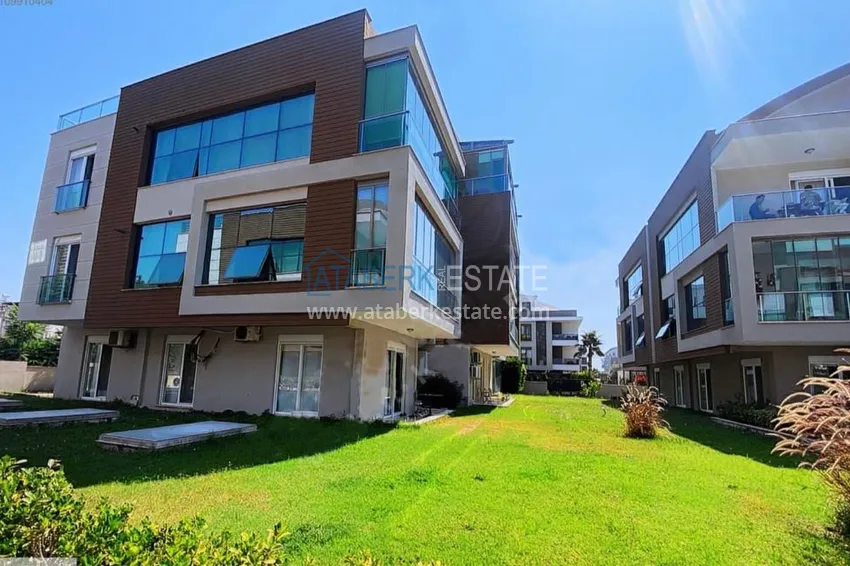 Квартира 2+1 с отдельной кухней и застекленным балконом в Анталии, район Лара – Гюзелоба 1 