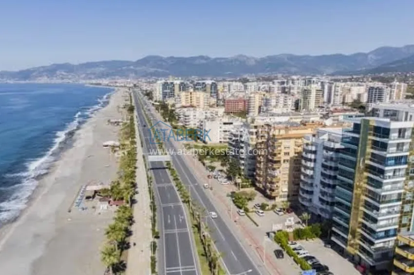 Квартира 1+1 с открытым видом на море и горы в комплексе на первой береговой, район Махмутлар – Алания 1
