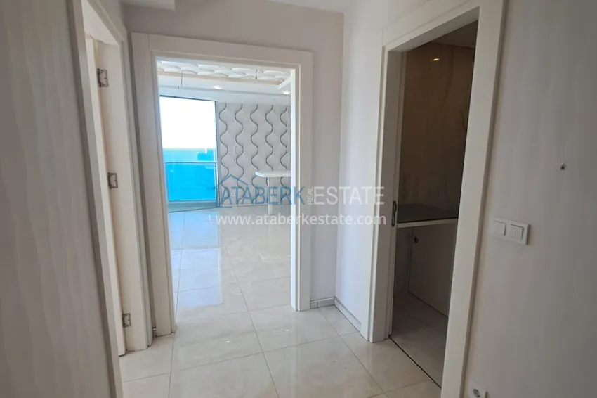 Приобрести Квартира 1+1 с открытым видом на море и горы в комплексе на первой береговой, район Махмутлар – Алания 1