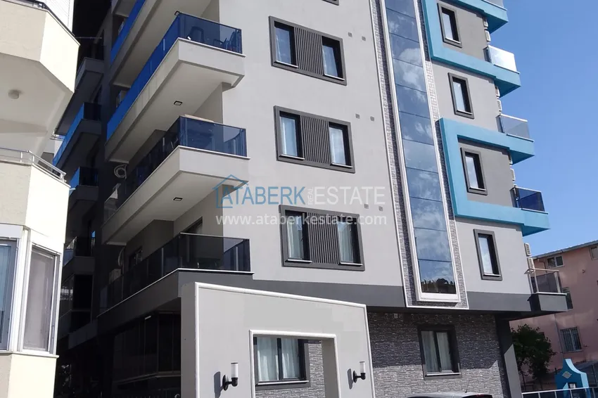 Срочная продажа! Меблированная двухкомнатная квартира в новой резиденции в в 250 метрах - район Махмутлар 2 