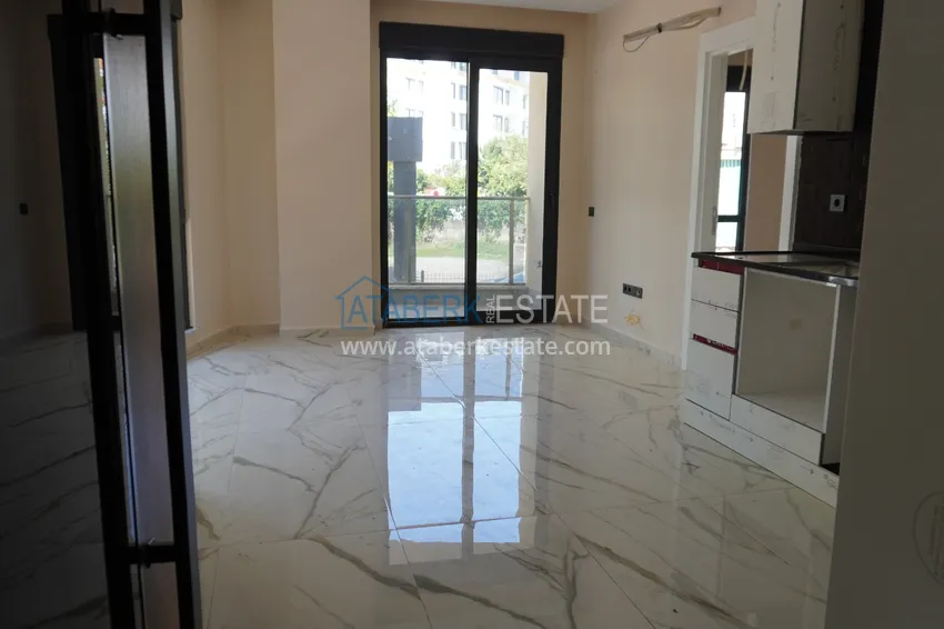 Приобрести Квартира 1+1 с чистовой отделкой в современном городском доме в самом центре Алании 1 