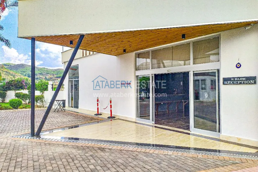 Квартира 2+1 с видом на горы и крепость в комплексе комфорт-класса с собственным пляжем, район Демирташ – Алания 22 