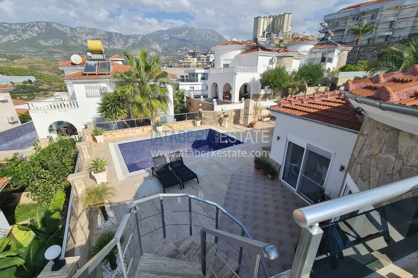 Приобрести Двухэтажная вилла с потрясающим видом на море в районе Каргыджак, Алания. Подходит для гражданства 24 