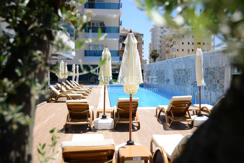 Квартира 2+1 меблированная в комфортабельном комплексе всего в 200 метрах от моря, район Махмутлар – Алания 2 