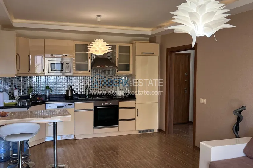 Приобрести Квартира 1+1 в районе Оба с мебелью в резиденции премиум-класса 2 