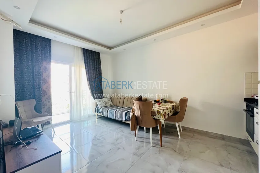 Приобрести Квартира 1+1 меблированная с видом на горы в резиденции комфорт-класса, район Оба – Алания 2 