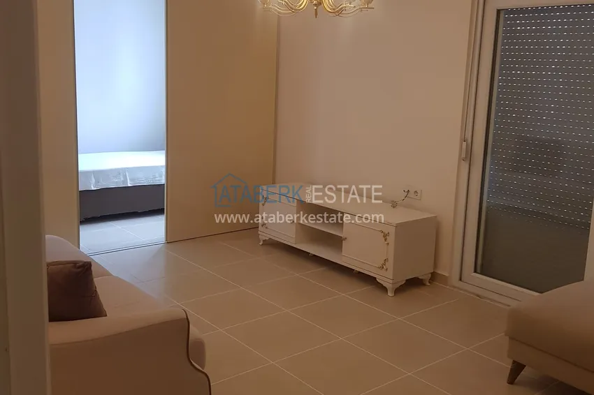 Приобрести Пентхаус-дуплекс 4+1 частично меблированный с видом на море и горы, район Махмутлар – Алания 3 