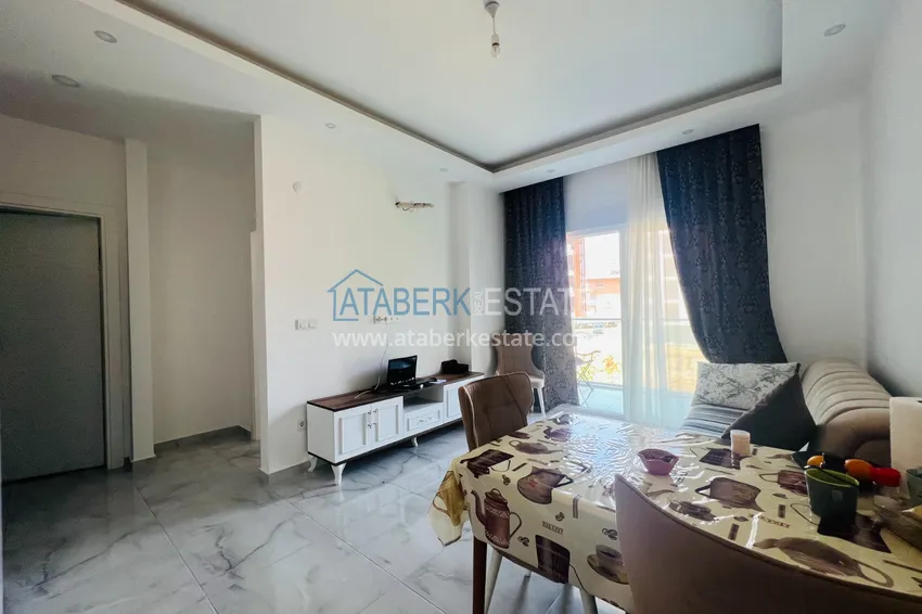 Приобрести Квартира 1+1 меблированная с видом на горы в резиденции комфорт-класса, район Оба – Алания 3 