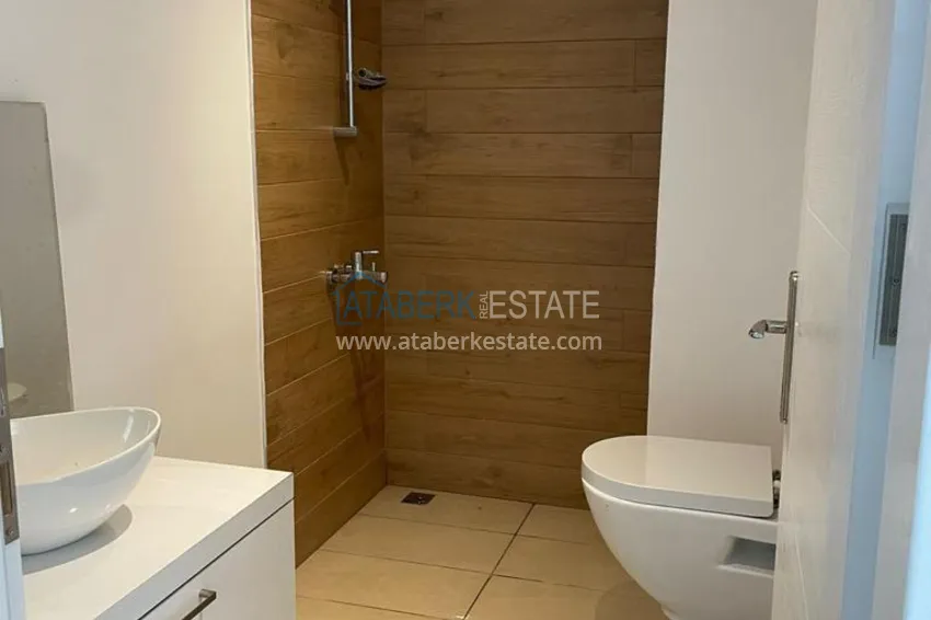 Приобрести Квартира 2+1 с видом на горы и крепость в комплексе комфорт-класса с собственным пляжем, район Демирташ – Алания 3 