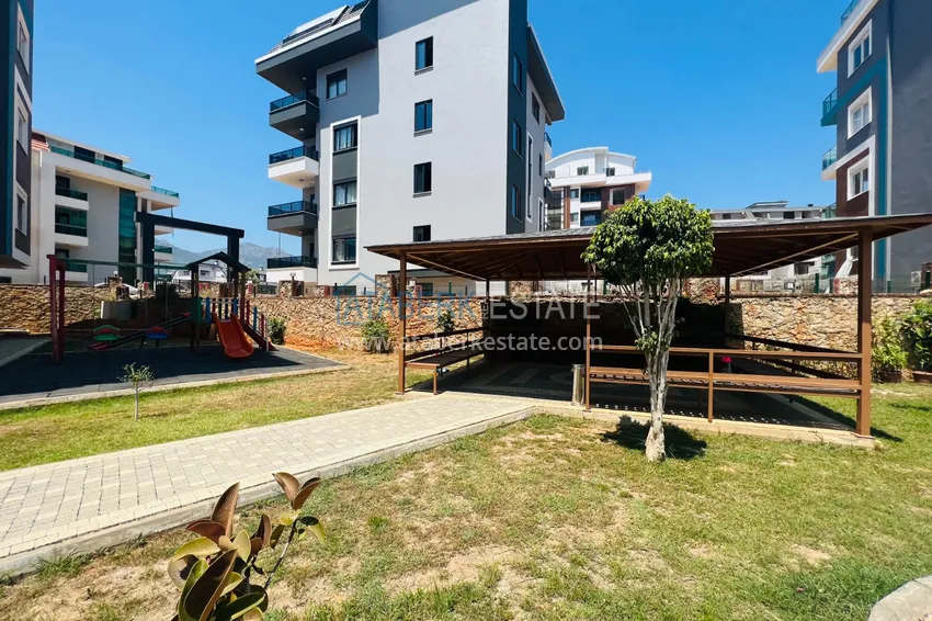 Квартира 1+1 меблированная с видом на горы в резиденции комфорт-класса, район Оба – Алания 4 