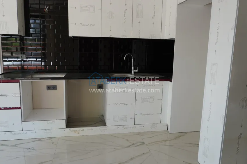 Приобрести Квартира 1+1 с чистовой отделкой в современном городском доме в самом центре Алании 5 