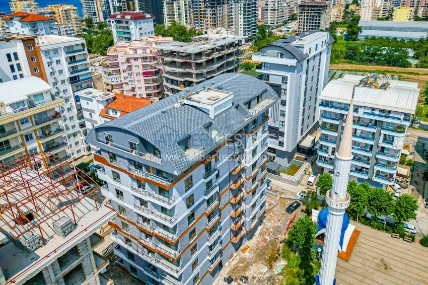 Квартира 1+1 от инвестора в комплексе на этапе строительства, район Махмутлар, Алания, 40 кв.м, 5 этаж 5 