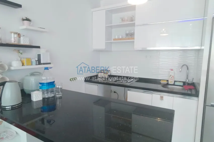 Приобрести Квартира 2+1 меблированная в комфортабельном комплексе всего в 200 метрах от моря, район Махмутлар – Алания 5 