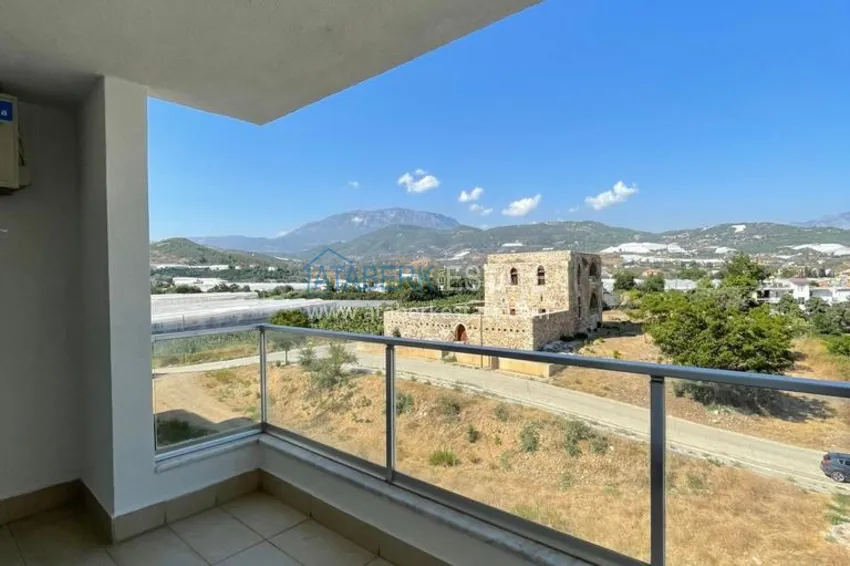 Приобрести Квартира 2+1 с видом на горы и крепость в комплексе комфорт-класса с собственным пляжем, район Демирташ – Алания 5 