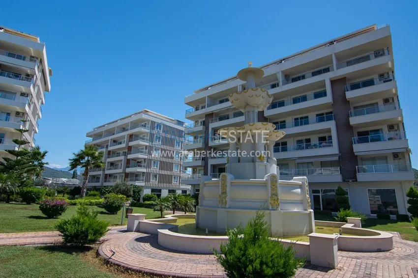 Квартира 2+1 с видом на горы и крепость в комплексе комфорт-класса с собственным пляжем, район Демирташ – Алания 13 