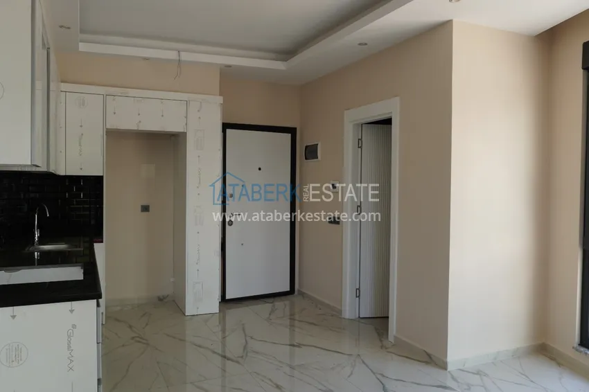 Приобрести Квартира 1+1 с чистовой отделкой в современном городском доме в самом центре Алании 6 