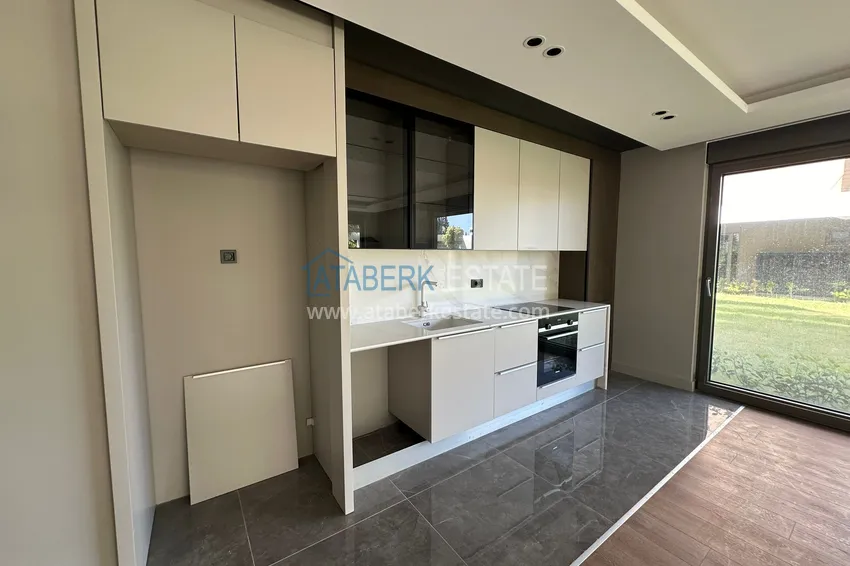 Приобрести Квартира 3+1 с выходом в сад и качественной чистовой отделкой в современном новом ЖК – Анталия, Унджалы 9 