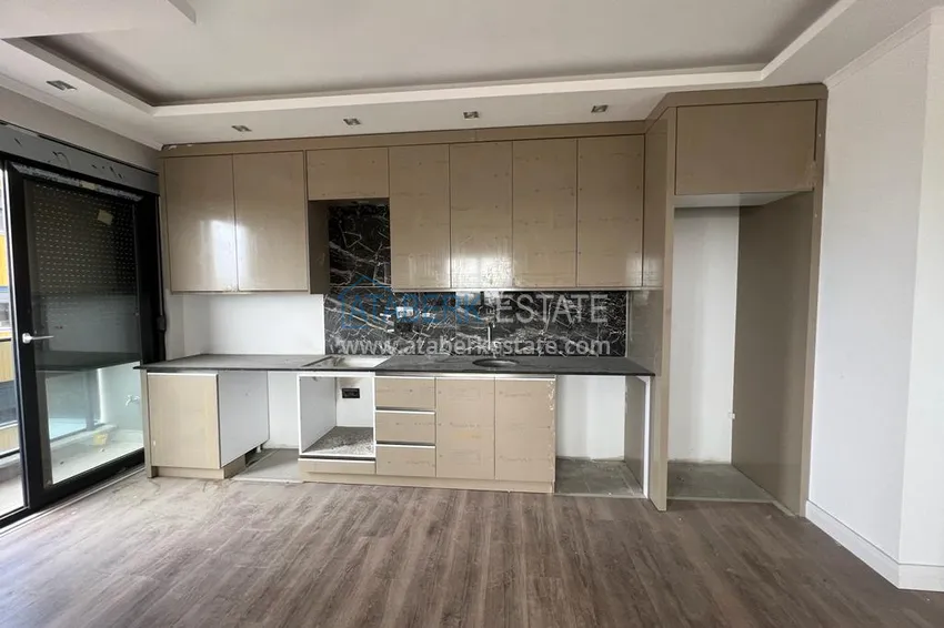 Приобрести Линейная квартира 3+1 с чистовой отделкой и видом на море в Газипаше, район Пазарджи  4 