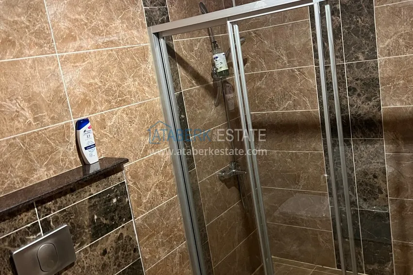 Приобрести Квартира 1+1 в районе Оба с мебелью в резиденции премиум-класса 7 