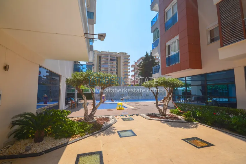 Квартира 2+1 меблированная в комфортабельном комплексе всего в 200 метрах от моря, район Махмутлар – Алания 7 