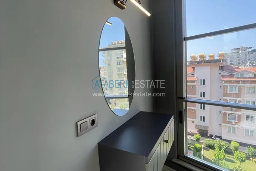 Приобрести Квартиры от собственника с дизайнерской чистовой отделкой в новостройке - центр Алании, район пляжа Клеопатра 7 