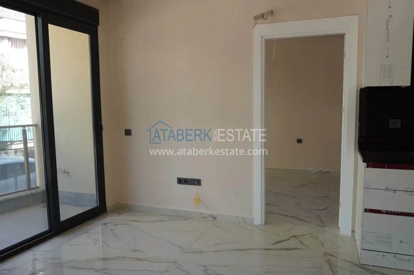 Приобрести Квартира 1+1 с чистовой отделкой в современном городском доме в самом центре Алании 7 