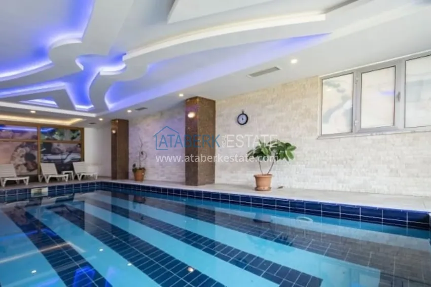 Квартира 1+1 с открытым видом на море и горы в комплексе на первой береговой, район Махмутлар – Алания 7