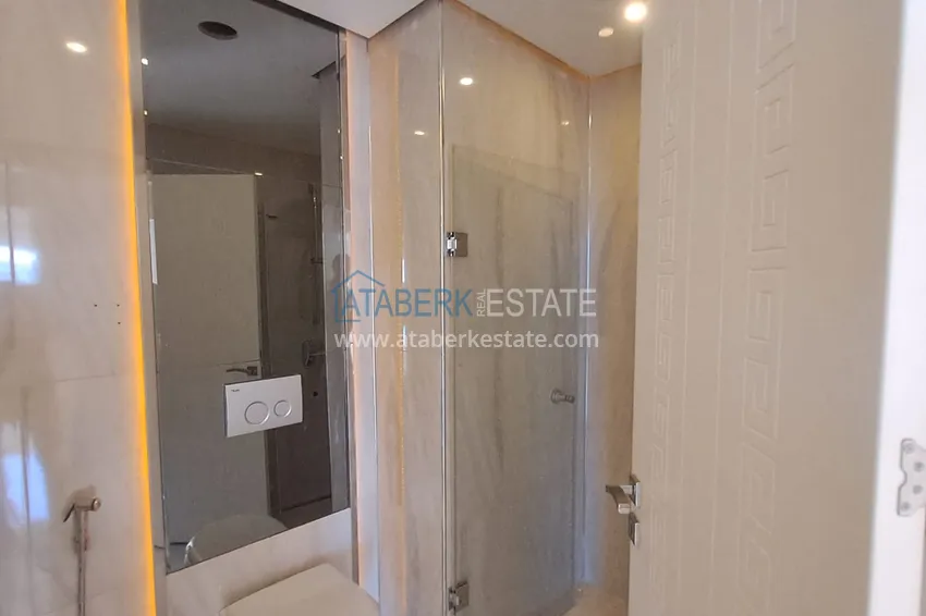 Приобрести Квартира 1+1 с открытым видом на море и горы в комплексе на первой береговой, район Махмутлар – Алания 7