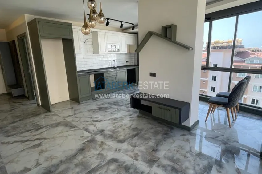 Квартиры от собственника с дизайнерской чистовой отделкой в новостройке - центр Алании, район пляжа Клеопатра 1 