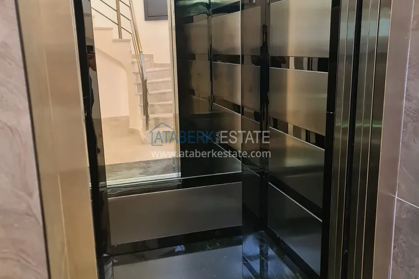 Квартира 1+1 с чистовой отделкой в современном городском доме в самом центре Алании 9 